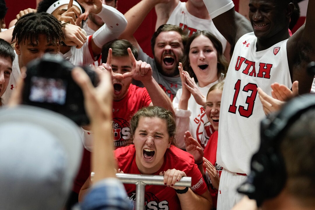 (Francisco Kjolseth | The Salt Lake Tribune) The student section celebrates with the University of Utah men’s basketball team as they light up the U following their 81 66 win over the Arizona Wildcats in NCAA basketball in Salt Lake City on Thursday, Dec. 1, 2022.