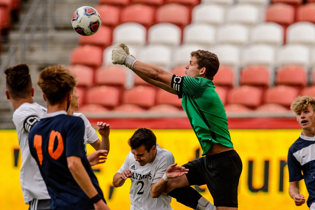 (Trent Nelson  |  The Salt Lake Tribune)  Olympus's Ian Jones (1) knocks the ball away as Olympus faces Brighton High School in the 5A boys state championship game at Rio Tinto Stadium in Sandy, Thursday May 23, 2019.