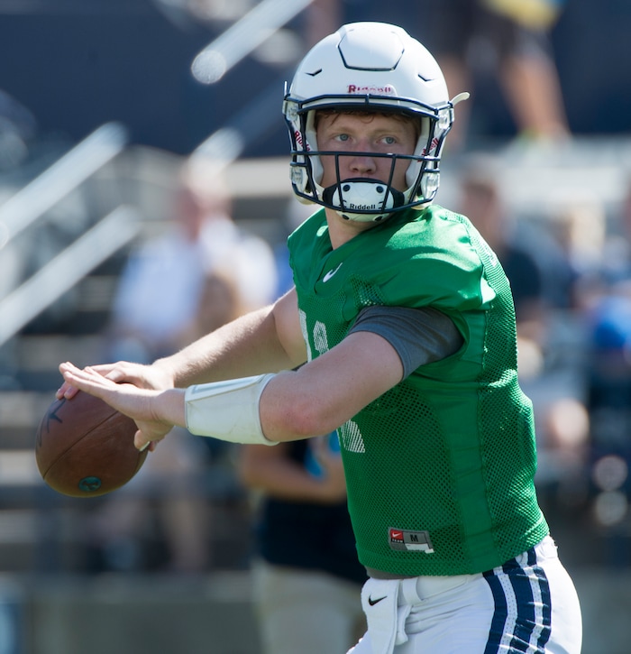 (Rick Egan  |  The Salt Lake Tribune)  Freshman quarterback Joe Critchlow (11) throws the ball, during the BYU scrimmage at Lavell Edwards Stadium, Thursday, August 17, 2017.