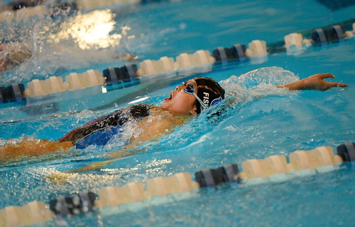 (Francisco Kjolseth  |  The Salt Lake Tribune)  Trixia Fisher of Stansbury competes in the Women 200 Yard Medley Relay at the high school swimming 4A State Championships in Bountiful, Friday February 9, 2018.