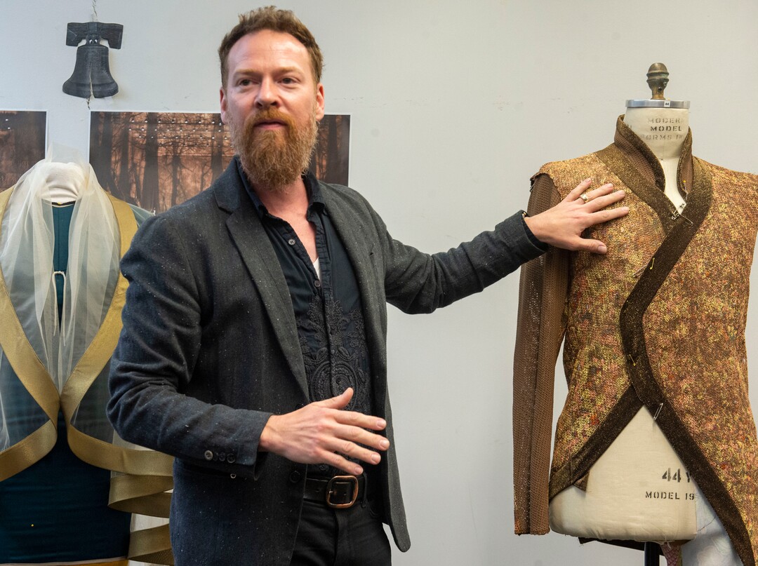 (Rick Egan  |  The Salt Lake Tribune)  "Project Runway" alum Bradon McDonald shows some of his original designs during a preview event for "Norma," at the Utah Opera Production Studios, Monday, April 15, 2019.