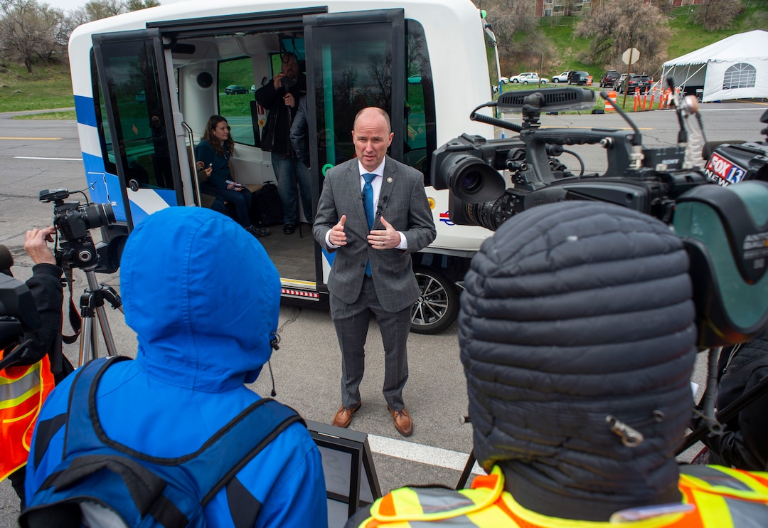 (Rick Egan  |  The Salt Lake Tribune)   Lt. Governor Spencer J. Cox talks to the media after his ride in the Autonomous Shuttle, at the test track is across the street from UDOT headquarters on the west side of 2700 West. Thursday, April 11, 2019.