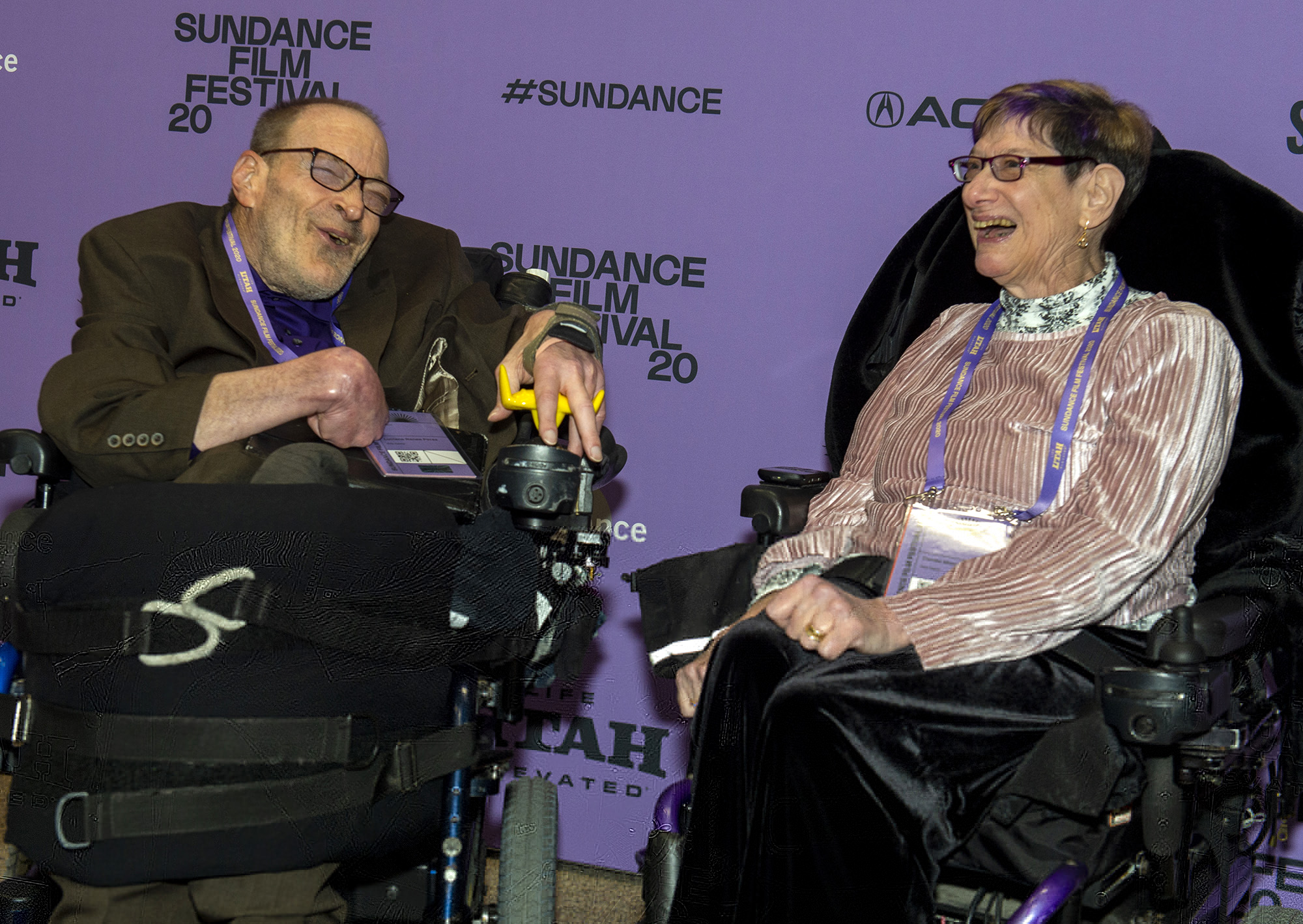 (Rick Egan  |  The Salt Lake Tribune)     Neil Jacobson shares a laugh with Denise Jacobson, on the red carpet for the film "Crip Camp", the opening night film of the 2020 Sundance Film Festival, at the Eccles Theatre in Park City, Thursday, Jan. 23, 2020.