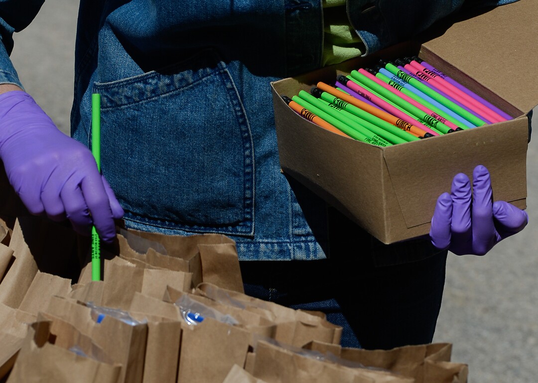 (Francisco Kjolseth  |  The Salt Lake Tribune) The UMFA learning engagement team assemble "UMFA Art Kits," to provide art supplies to high school students to help them complete end-of-year course work. The volunteers filled 1,500 kits with colored pencils, postcards and art activities on Friday, May 4, 2020, to help kids in the Granite School District and Whitehorse High School in San Juan County, to finish school projects and get excited about home projects during the coronavirus pandemic.