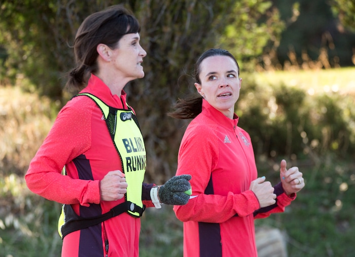 (Rick Egan  |  The Salt Lake Tribune) Becky Andrews and Alanna Whetsel train for the Boston Marathon by running along David Boulevard in Bountiful, Thursday, March 29, 2018.