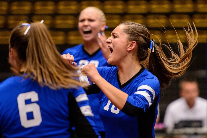 (Trent Nelson | The Salt Lake Tribune) Panguitch players celebrate a point as Panguitch defeats Rich in the 1A State Volleyball Championship game in Orem, Saturday October 28, 2017.