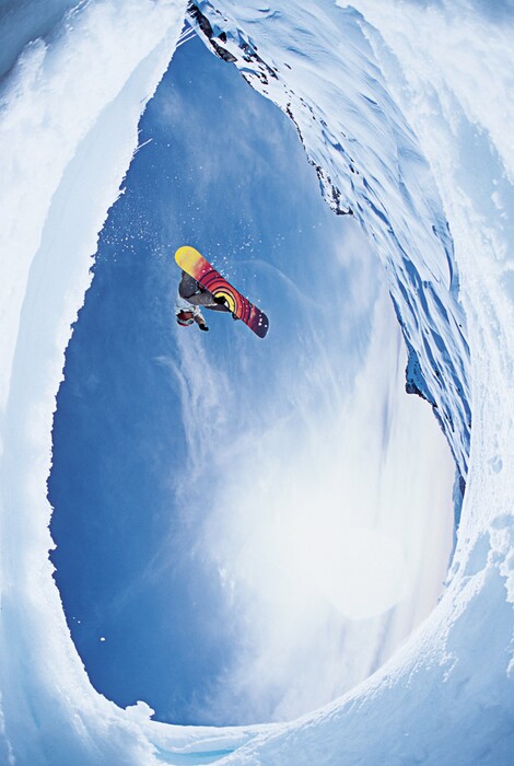 (Courtesy photo) Natasha Zurek drops in on an ice-wave during the filming of Warren Miller's 2004 movie "Impact."