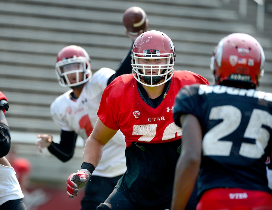 Scott Sommerdorf   |  The Salt Lake TribuneUtah OL Jackson Barton from Brighton High, protects QB Kendal Thompson as he looks to throw during practice, Thursday, August 20, 2015. 