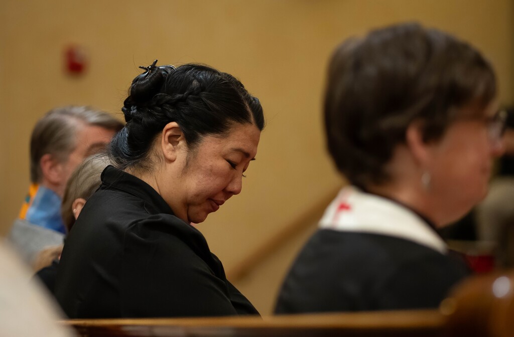 (Francisco Kjolseth | The Salt Lake Tribune) The Rev. Irene Pak Lee, a second-generation Korean American pastor, prays during an interfaith prayer service at First Presbyterian Church in Salt Lake City to demand justice and safety for immigrants and refugees on Thursday, May 8, 2025.