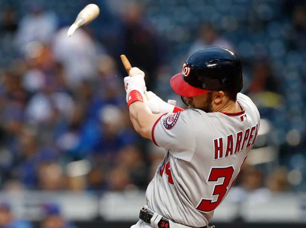 Washington Nationals' Bryce Harper hits a solo home run in the first inning of a baseball game against the New York Mets, Monday, April 16, 2018, in New York. (AP Photo/Kathy Willens)
