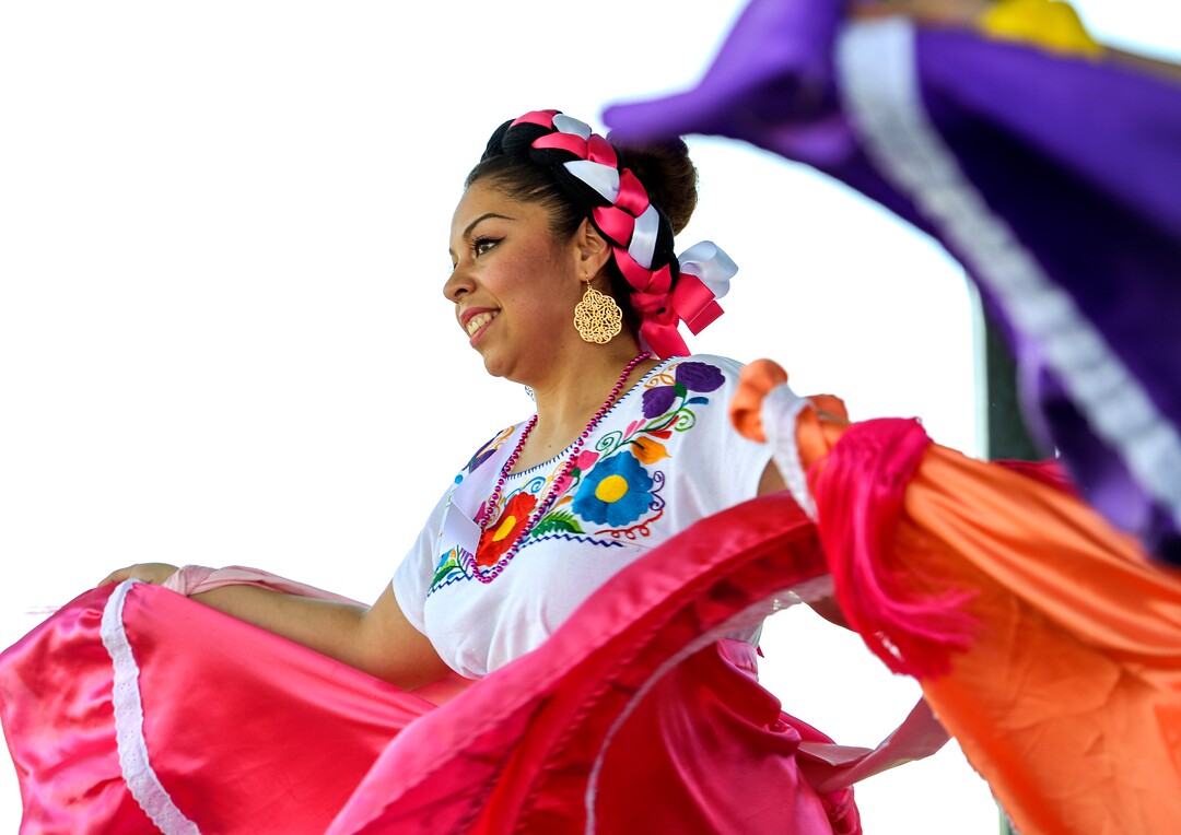 (Leah Hogsten  |  The Salt Lake Tribune) Tuttilli Ballet Folklorico dancer Yesenia Rivas performs at the Cinco de Mayo Celebration, Saturday, May 5, 2018 at Centennial Park in West Valley City.