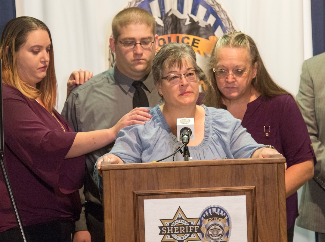 (Rick Egan  |  The Salt Lake Tribune)  Jeanne Long, sister of homicide victim Valerie Sue Brantzeg, is flanked by family members as she speaks at a news conference about her sister, at the Salt Lake County Sheriff's Office, Friday, Sept. 7, 2018. Formal charges have been filed against Walter Eugene Brantzeg, Valerie's estranged husband, in her death.