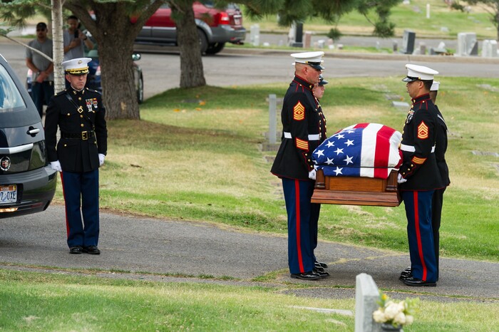 (Alex Gallivan  |  Special to the Tribune) Members of the Marine Corp Honor Guard receive the body of Marine Pfc. Robert K. Holmes, who died 77 years ago aboard the USS Oklahoma during the attack on Pearl Harbor, is laid to rest in the Salt Lake City Cemetery, Monday, Aug. 20, 2018.