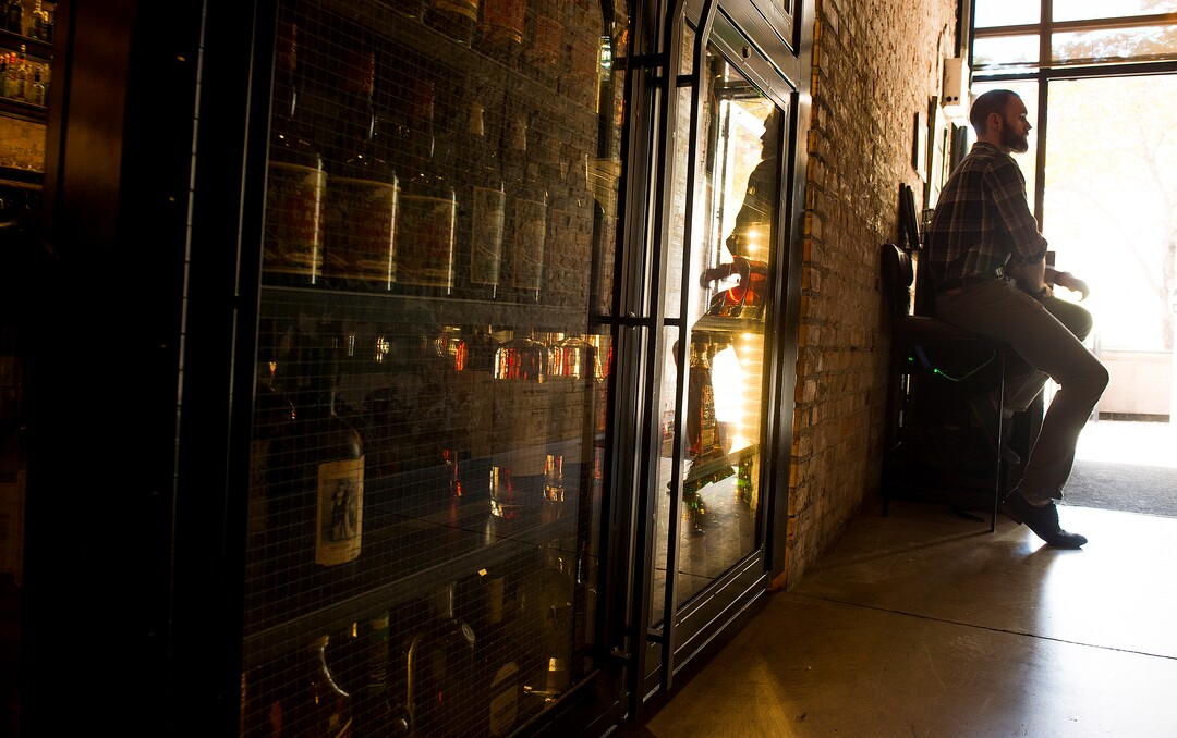 (Leah Hogsten  |  The Salt Lake Tribune) White Horse Spirits and Kitchen host Harrison Archibald awaits customers.