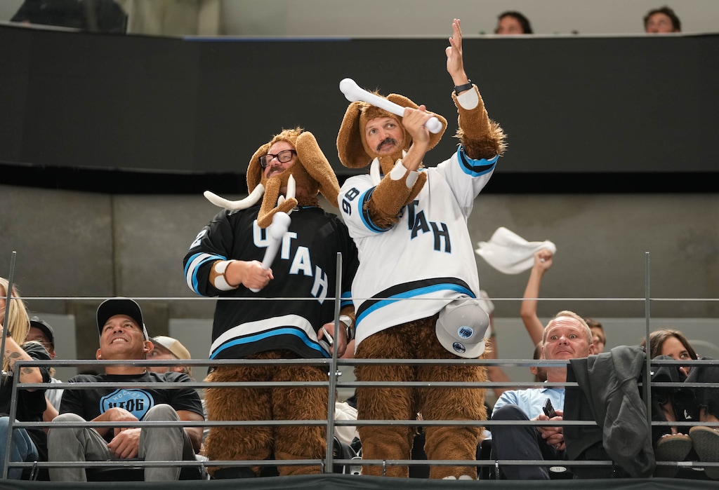 (Francisco Kjolseth | The Salt Lake Tribune) Utah hockey fans dress up as mammoth's as they celebrate Utah Hockey Club's first inaugural NHL season with a win at the Delta Center against the Chicago Blackhawks in Salt Lake City on Tuesday, Oct. 8, 2024.