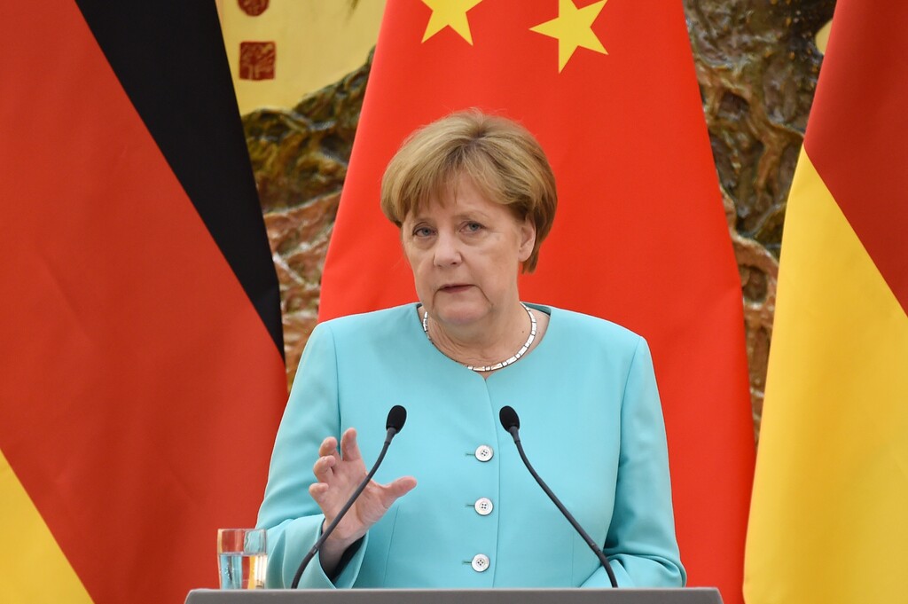 German Chancellor Angela Merkel speaks during a joint press conference with Chinese Premier Li Keqiang following a meeting at the Great Hall of the People in Beijing, Monday, June 13, 2016. Merkel is on a three-day visit to China. (Wang Zhao/Pool Photo via AP)