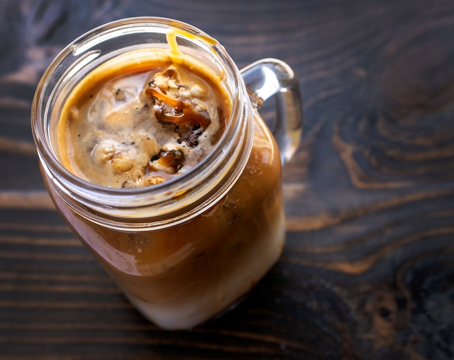 (Leah Hogsten | The Salt Lake Tribune) Old Cuss Coffee's Snix Mock-E-ato made with house made caramel, mocha syrup, milk, a double shot of espresso and topped with pieces of candy bar, April 1, 2022.