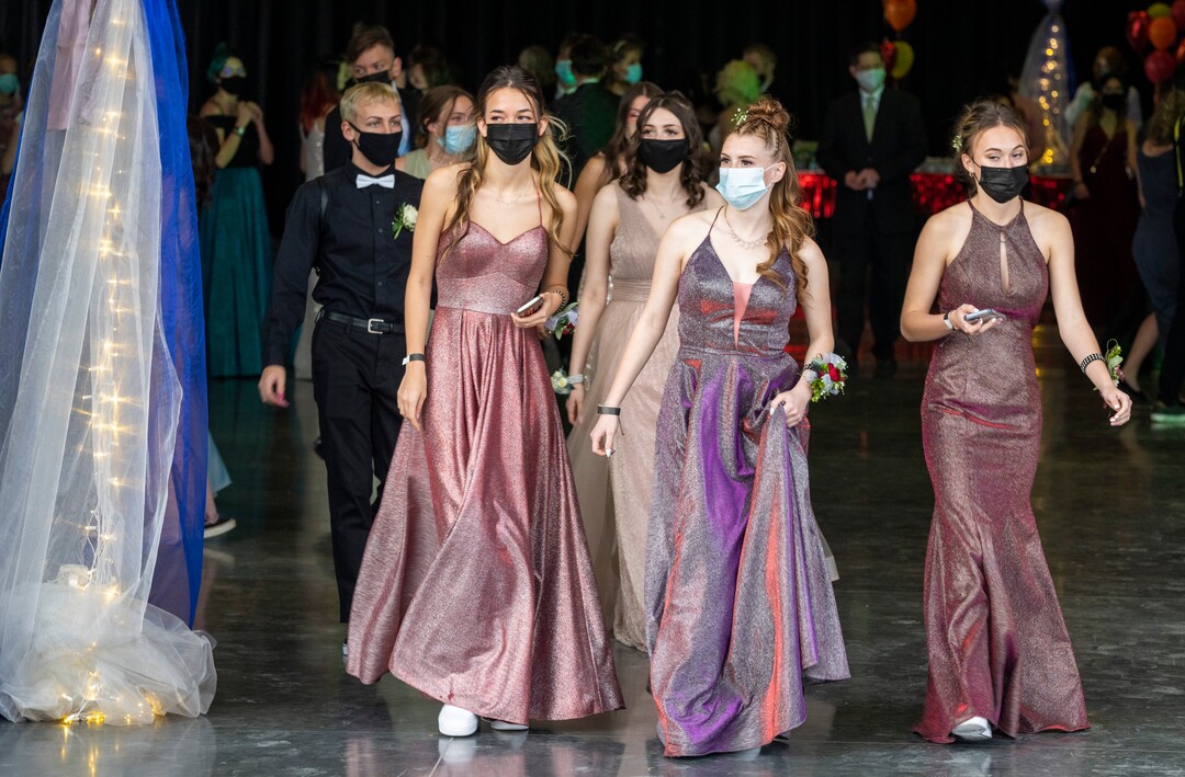 (Rick Egan | The Salt Lake Tribune)Masked high school students enter the Cyprus High school Prom, at the Viridian Event Center, on Saturday, April 24, 2021.