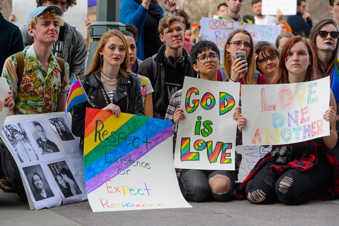 (Trent Nelson  |  The Salt Lake Tribune) Demonstrators at a rally about BYU's changing position on “romantic behavior” by same-sex couples gather in front of the headquarters of The Church of Jesus Christ of Latter-day Saints in Salt Lake City on Friday, March 6, 2020.