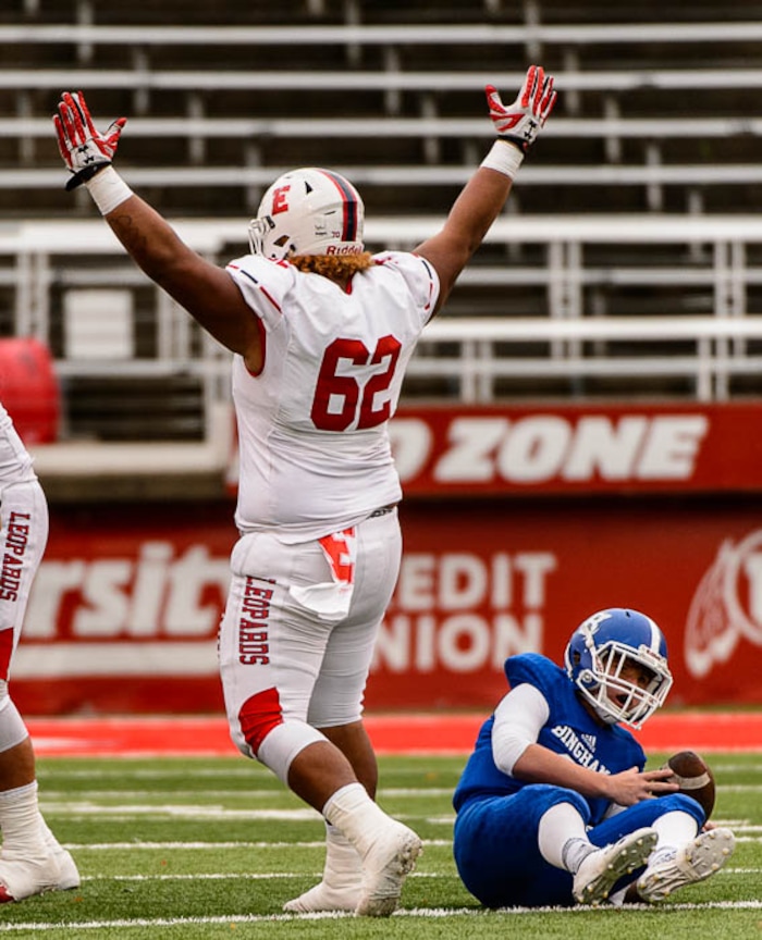 (Trent Nelson | The Salt Lake Tribune)  East's Apu Ika (62) celebrates a sack of Bingham's Ryan Wood (2) as East faces Bingham in the Class 6A High School State Football Championship game in Salt Lake City, Friday November 17, 2017.