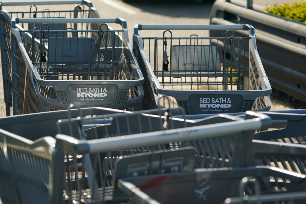 (Rogelio V. Solis | AP Photo) Bed Bath & Beyond shopping carts are left in a corral in Flowood, Miss., on Monday, April 24, 2023. One of the original big box retailers, the company filed for bankruptcy protection on Sunday, April 23, following years of dismal sales and losses.