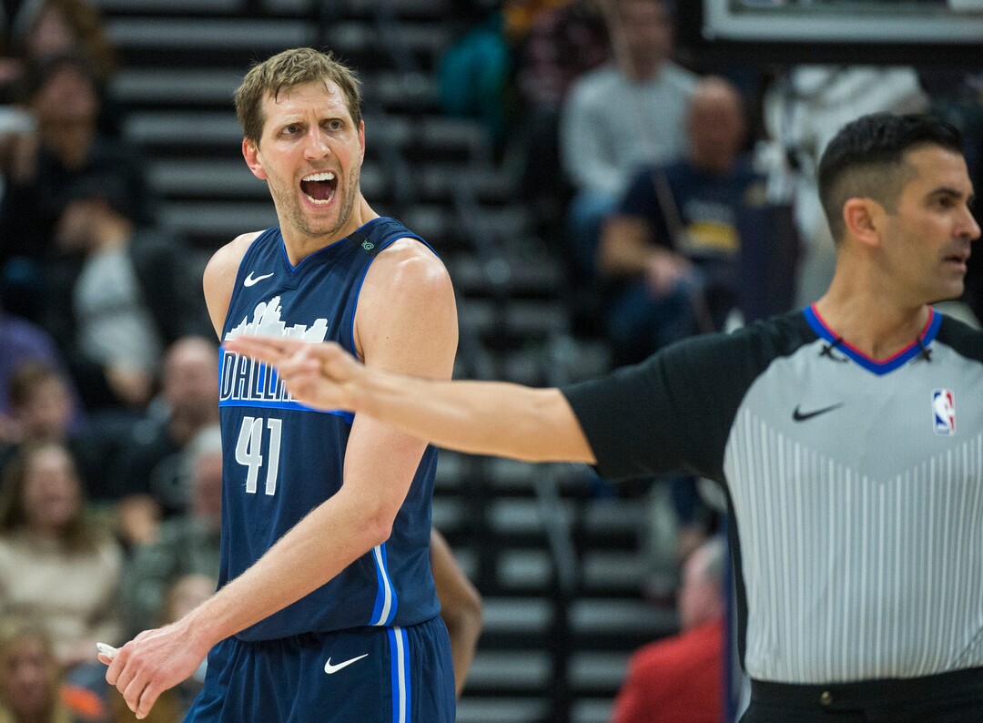 (Rick Egan  |  The Salt Lake Tribune)    Dallas Mavericks forward Dirk Nowitzki (41) reacts to a call by the official, after colliding with Utah Jazz guard Ricky Rubio (3), He was called for a technical foul on the play, in NBA action between Utah Jazz and Dallas Mavericks in Salt Lake City, Saturday, Feb. 24, 2018.