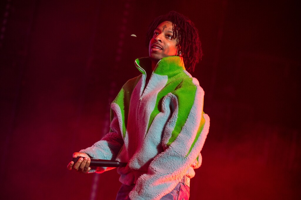 (Paul R. Giunta | Invision/AP) 21 Savage performs during Lil Baby's Birthday Party at State Farm Arena on Saturday, Dec. 9, 2022, in Atlanta. The artist will be part of the celebrity game at NBA All-Star Weekend this month in Salt Lake City.