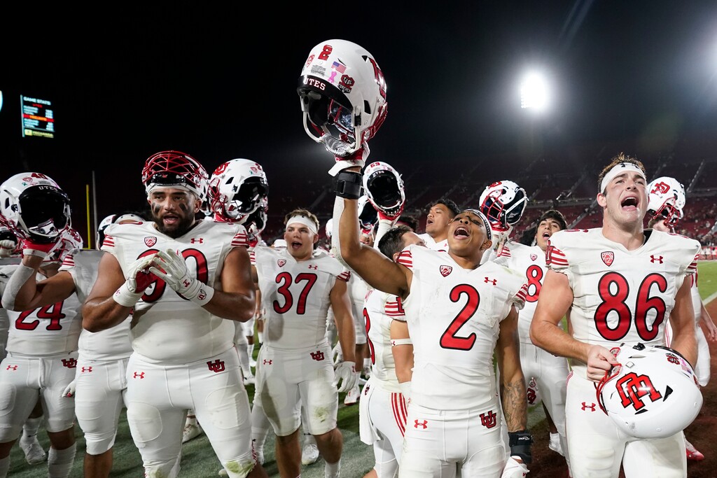 (Marcio Jose Sanchez | AP) Utah players celebrate a win over Southern California in an NCAA college football game Saturday, Oct. 9, 2021, in Los Angeles.