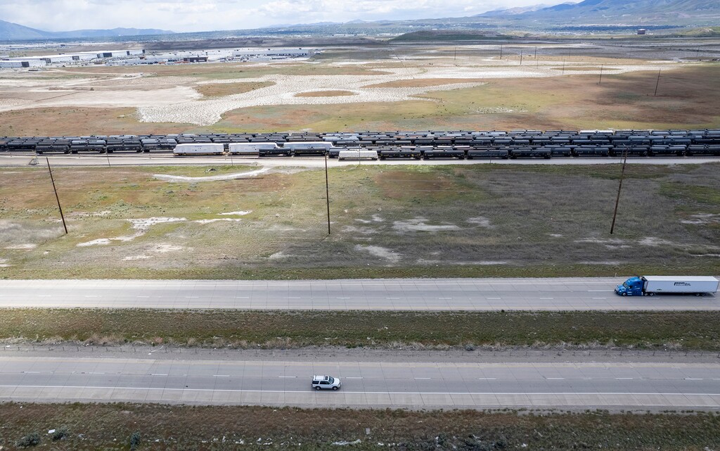 (Rick Egan | The Salt Lake Tribune) Cars and trains pass by the west side of the Salt Lake Valley on Friday, May 20, 2022.