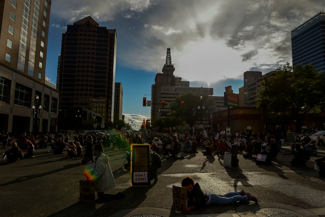 (Leah Hogsten  |  The Salt Lake Tribune) Demonstrators marched from the Utah Capitol down State Street, stopping at every intersection for five minutes in honor of George Floyd, June 8, 2020.