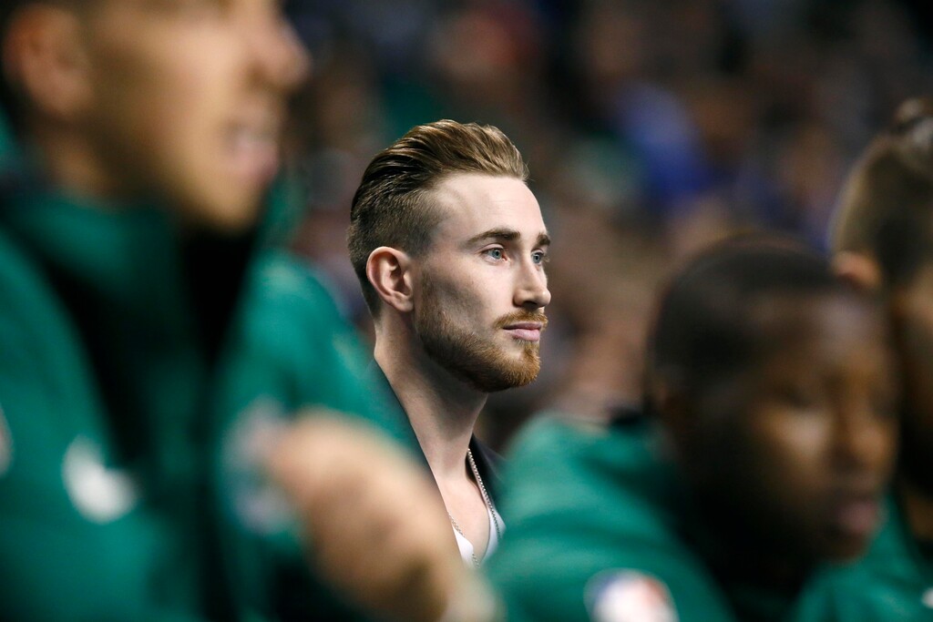 Boston Celtics' Gordon Hayward watches from behind the bench during the first quarter of an NBA basketball game against the Golden State Warriors in Boston, Thursday, Nov. 16, 2017. (AP Photo/Michael Dwyer)