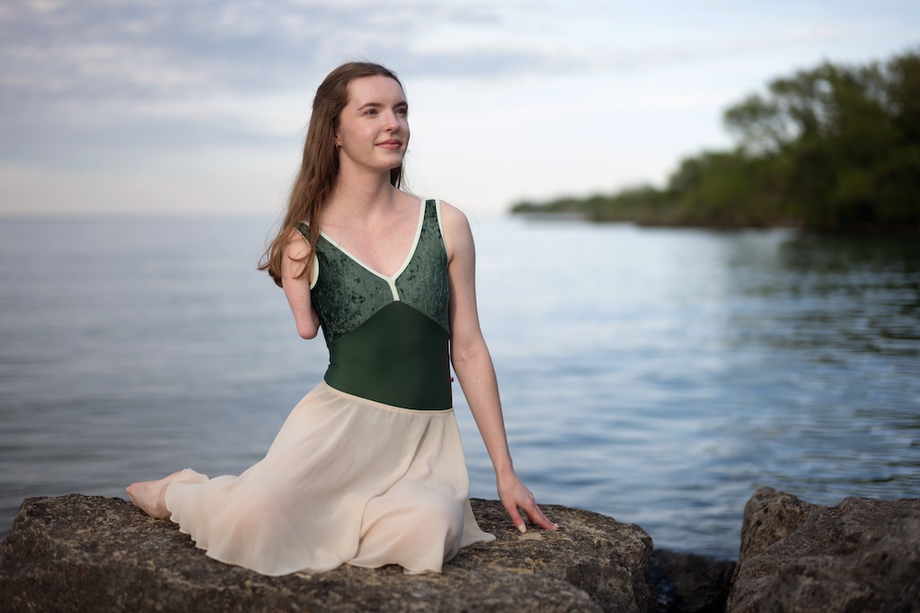 Olivia Book, a member of the corps de ballet of Ballet West, in Salt Lake City, on the shore of Lake Ontario in her hometown of Grimsby, Canada, on May 21, 2026. ÒPart of my ballet journey is that I always felt sort of behind, or like I wasnÕt the specific ballet dancer that is expected,Ó Book says. (Ian Willms/The New York Time)