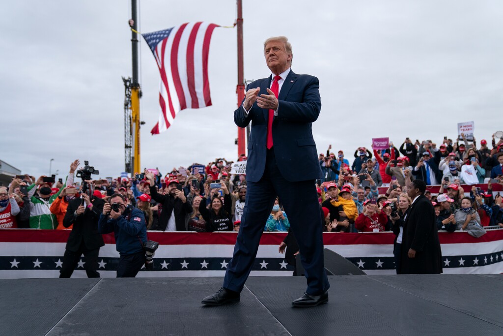 (Evan Vucci | AP photo)
In this Sept. 10 photo, President Donald Trump arrives for a campaign rally at MBS International Airport in Freeland, Mich. Campaigns are using different tactics in a pandemic election year unlike any other as candidates try to win over voters in down-ballot races that will determine control of Congress. Trump is setting the tone for his party with big rallies and few masks.