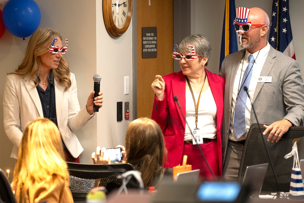 (Rick Egan | The Salt Lake Tribune) From left, Utah State Board of Education member Jennie Earl, state superintendent Molly Hart, and board member Cole Kelley sing happy birthday for America's 250th birthday during a board meeting on Thursday, April 2, 2026.