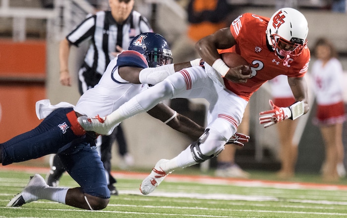 Rick Egan  |  The Salt Lake Tribune

Utah Utes quarterback Troy Williams (3) is brought down by Arizona Wildcats safety Tellas Jones (1), in PAC-12 football action, Utah vs. The Arizona Wildcats, at Rice-Eccles Stadium, Saturday, October 8, 2016.