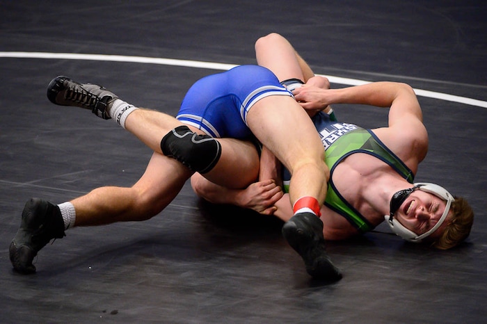 (Trent Nelson | The Salt Lake Tribune)  Syracuse's Mitch Parker (right) and Bingham's Payton Clark, 6A State Championships, high school wrestling quarterfinals in Orem, Wednesday February 7, 2018.