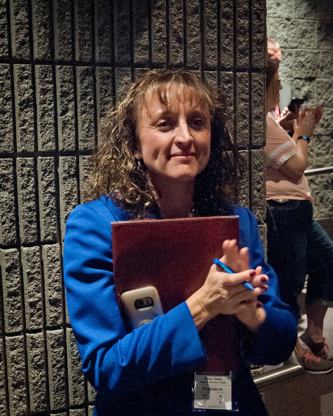 (Michael Mangum  |  Special to the Tribune)  Julie Dole applauds for the remaining candidates after learning she was eliminated in the first round of voting during the recorder election at the county republican Central Committee Meeting at Jordan High School in Sandy, UT on Thursday, August 17, 2017.