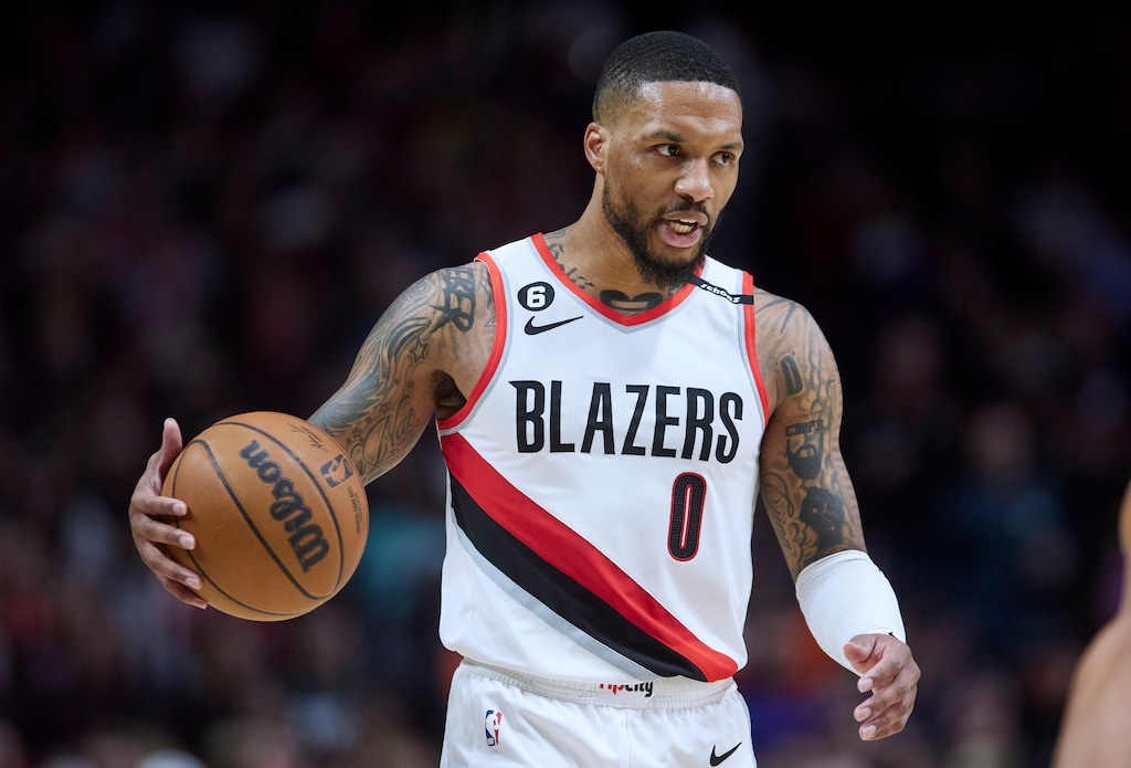FILE - Portland Trail Blazers guard Damian Lillard brings the ball up against the New York Knicks during the second half of an NBA basketball game in Portland, Ore., Tuesday, March 14, 2023. Damian Lillard asked his team for a trade Saturday, July 1, a person with knowledge of the matter told The Associated Press. (AP Photo/Craig Mitchelldyer, File)