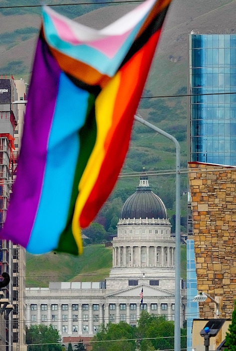 (Francisco Kjolseth | The Salt Lake Tribune) The Utah State Capitol is pictured on Tuesday, May 23, 2023, as a pride flag flaps in the wind. 