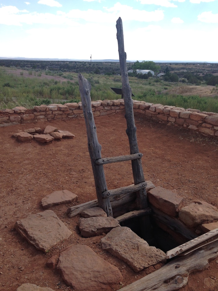 (Erin Alberty | The Salt Lake Tribune) A ladder from the roof allows visitors to climb into a restored underground dwelling, called a kiva, at Edge of the Cedars State Park on June 11, 2016 in Blanding.