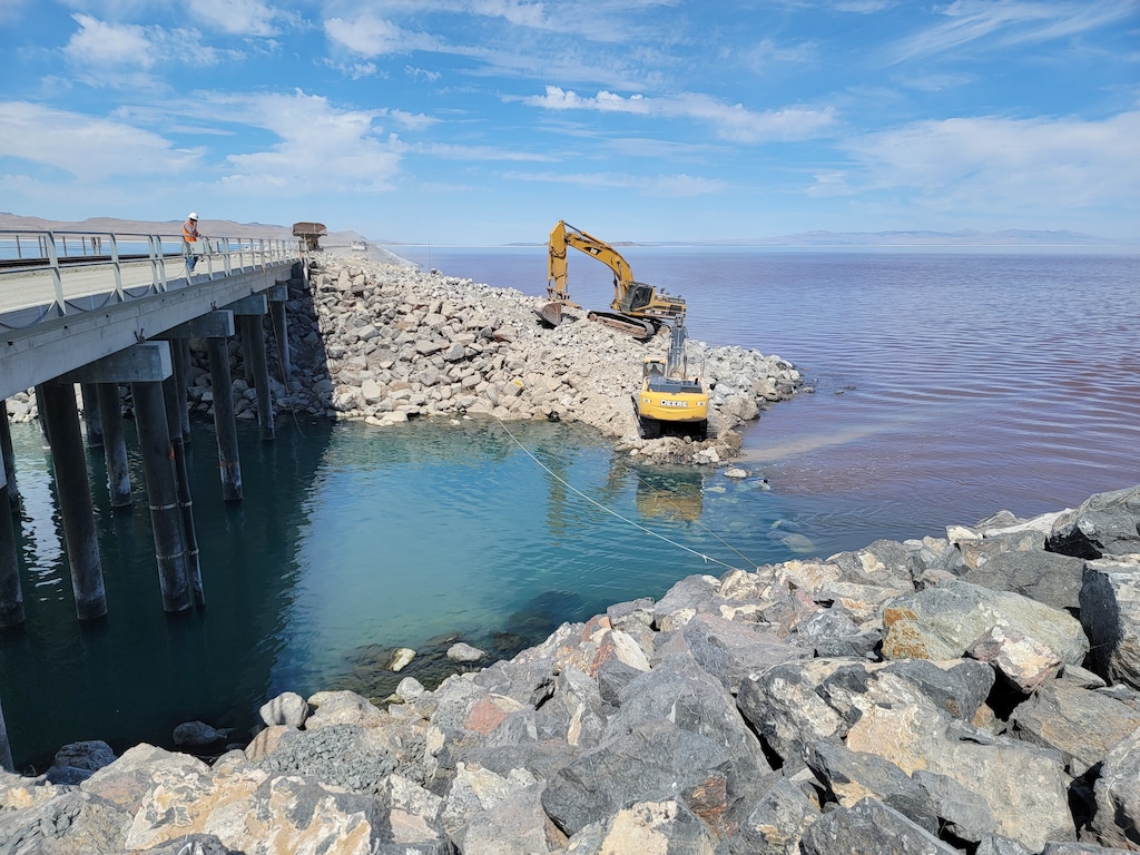 (Image courtesy of the Utah Division of Water Resources) Crews raise the breach in a rock-filled causeway bisecting the Great Salt Lake in an effort to stave off rising salinity in the lake's south arm, seen here in July 2022. Gov. Spencer Cox recently ordered the breach be raised another five feet.