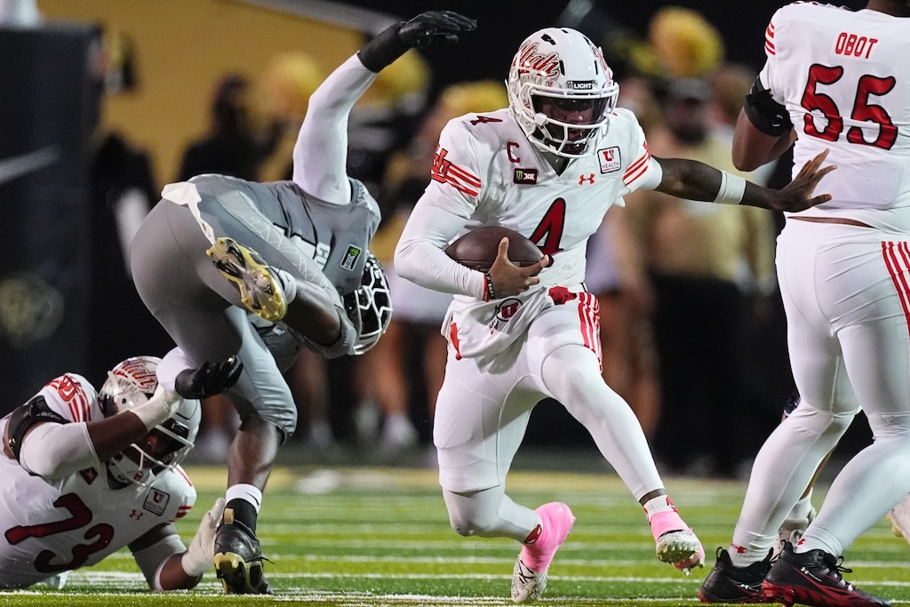 (David Zalubowski | AP Photo)Utah quarterback Devon Dampier runs past Colorado defensive end Manny Ezeogu in the first half of an NCAA college football game Saturday, Oct. 17 2026, in Boulder, Colo.