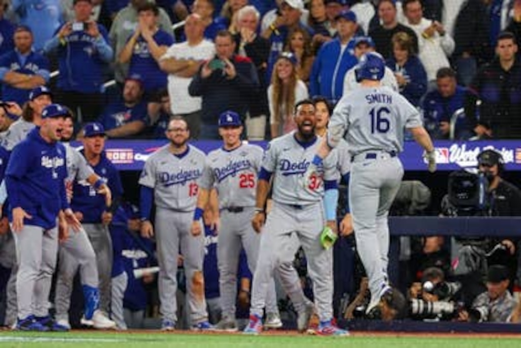 (Getty Images via The Athletic) The Los Angeles Dodgers celebrate Will Smith's go-ahead home run in the 11th inning of their 5-4 win over the Toronto Blue Jays in Game 7 of the World Series on Sunday, Nov. 2, 2025, in Toronto.