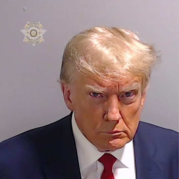 (Fulton County Sheriff's Office via AP) This booking photo provided by Fulton County Sheriff's Office shows former President Donald Trump on Thursday, Aug. 24, 2023, after he surrendered and was booked at the Fulton County Jail in Atlanta. Trump is accused by District Attorney Fani Willis of scheming to subvert the will of Georgia voters in a desperate bid to keep Joe Biden out of the White House.