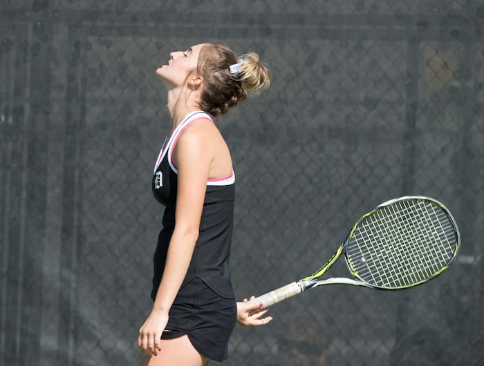 (Rick Egan  |  The Salt Lake Tribune) Mackenzie Turley, Davis High, reacts after missing a shot, as she plays Daniella Aaron, Lone Peak, in the 6A High School tennis championship game.  Turley defeated Aaron to place first in the #1 singles Friday, October 6, 2017.


