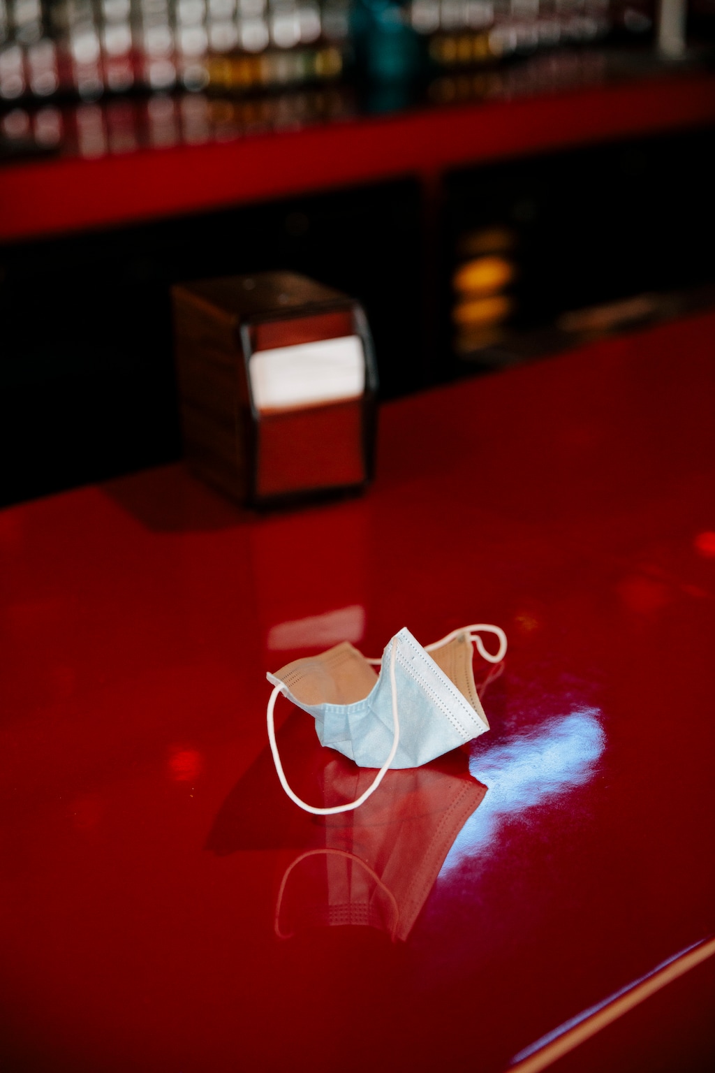 (Kendrick Brinson | The New York Times)
A discarded mask at a bar in Los Angeles, June 15, 2021. "The desperate desire to get back to normal is understandable," writes New York Times columnist Michelle Goldberg. "What's odd is seeing the absence of normality as a political betrayal instead of an epidemiological curveball."