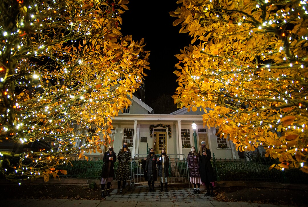 (Rick Egan | The Salt Lake Tribune)  Temple Square is closed, but sister missionaries sing Christmas carols in front of the Beehive House, in downtown Salt Lake City, Friday, Nov. 27, 2020.