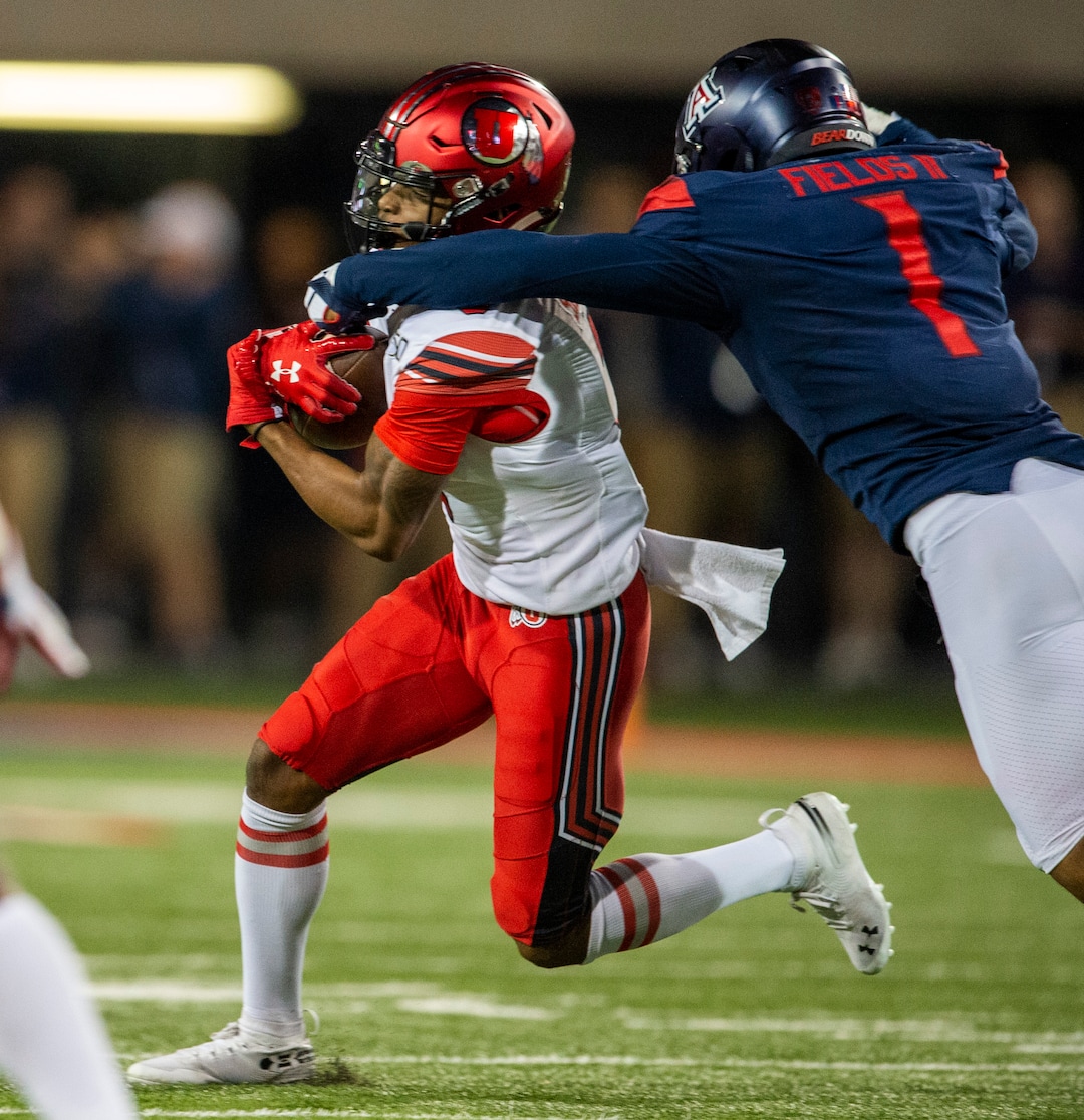 (Rick Egan  |  The Salt Lake Tribune)      Arizona Wildcats linebacker Tony Fields II (1) is called for a penalty as he grabs Utah Utes wide receiver Demari Simpkins (3) by the face mask, in PAC-12 action between the Utah Utes and the Arizona Wildcats in Tucson, Saturday, Nov. 23, 2019.