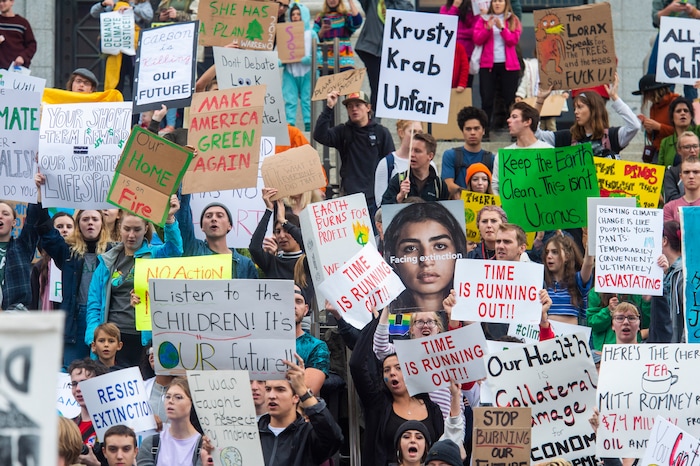(Rick Egan  |  The Salt Lake Tribune)      Hundreds of students from around the state chant and sing as they gather on the steps of the Utah State Capitol Building, demanding action on the climate crisis. Friday, Sept. 20, 2019.