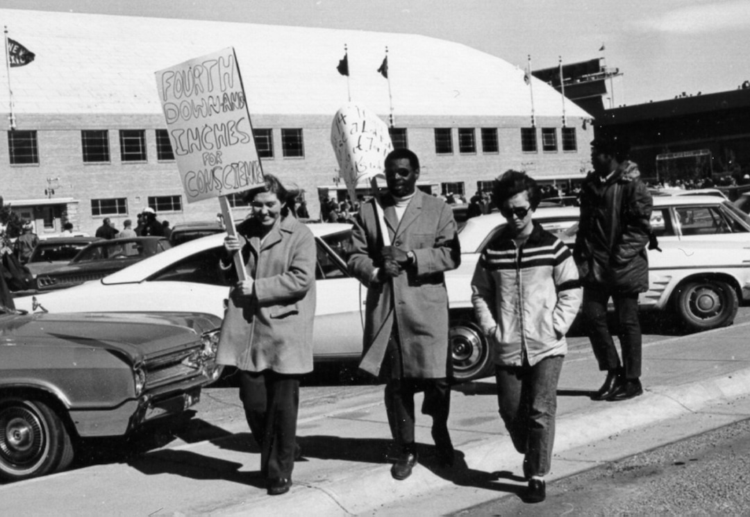 (photo courtesy the University of Wyoming) Kathy Karpan, left, who later went on to run for Governor in Wyoming, protests with unknown others during the Black 14 incident in Wyoming.photo courtesy the University of Wyoming